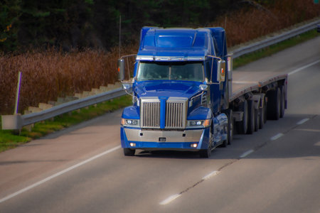 Heavy truck on a Canadian highway in the fall in Quebecの写真素材