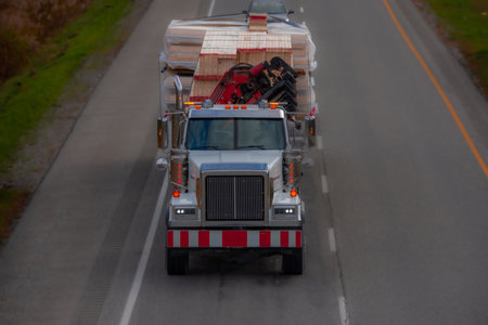 Heavy truck on a Canadian highway in the fall in Quebecの写真素材