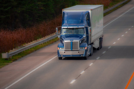 Heavy truck on a Canadian highway in the fall in Quebecの写真素材
