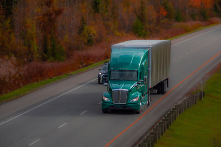 Heavy truck on a Canadian highway in the fall in Quebecの写真素材
