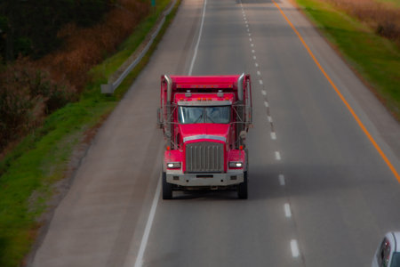 Heavy truck on a Canadian highway in the fall in Quebecの写真素材