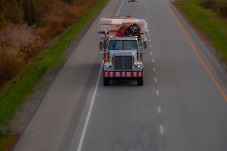 Heavy truck on a Canadian highway in the fall in Quebecの写真素材