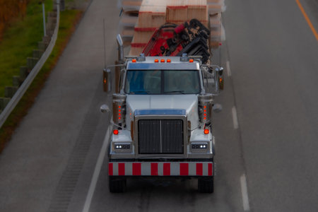Heavy truck on a Canadian highway in the fall in Quebecの写真素材