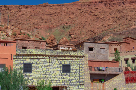 Moroccan architecture along a country road crisscrossing the countryの写真素材