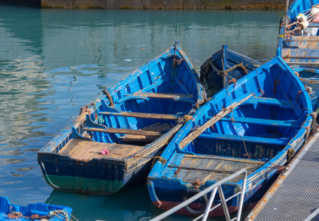 Fishing boat in the port of the city of Essaouira in Moroccoの写真素材