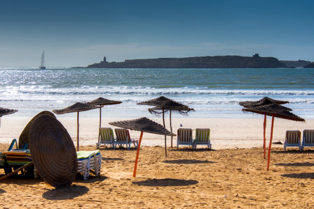 Palapas and chair installed the beach of Essaouira in the west of Moroccoの写真素材