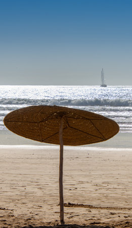 Palapas installed on the beach of Essaouira in the west of Moroccoの写真素材