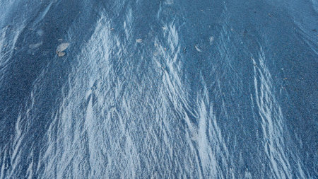 Texture of the sand on Essaouira beach in Morocco after the water has receded