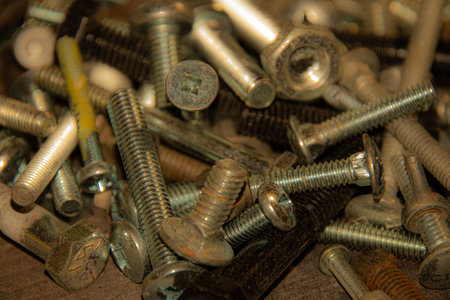 Group of bolts left on the workbench in the basement of the house