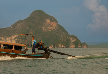 Tourist boat in their small boats in the famous Phang Khao Lak bay in southern Thailandのeditorial素材