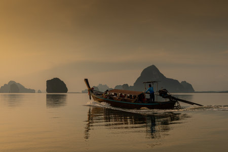 Tourist boat in their small boats in the famous Phang Khao Lak bay in southern Thailand