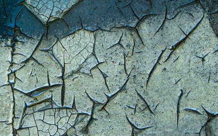 Texture of old cracked paint on metal surface. Abstract background for design.の写真素材