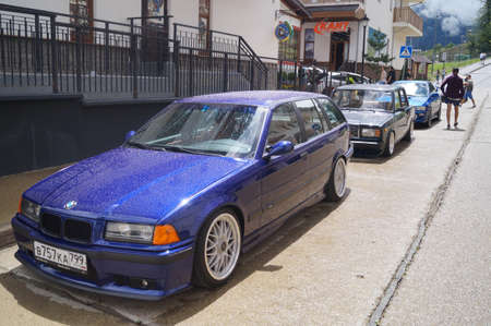 Sochi, Russian Federation, August 2018: Open automobile festival Grounded event. Unusual BMW car tuning, air suspension, sports parts and polished wheels. Stance. In the hotel parking lot.のeditorial素材