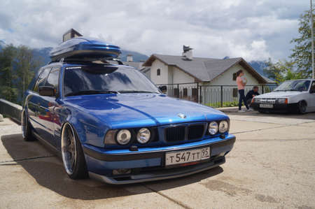 Sochi, Russian Federation, August 2018: Open automobile festival Grounded event. Unusual BMW car tuning, air suspension, sports parts and polished wheels. Stance. In the hotel parking lot.のeditorial素材