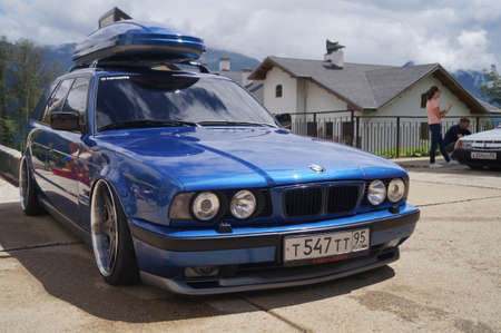 Sochi, Russian Federation, August 2018: Open automobile festival Grounded event. Unusual BMW car tuning, air suspension, sports parts and polished wheels. Stance. In the hotel parking lot.のeditorial素材