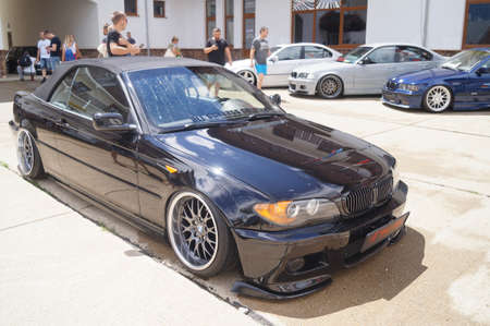 Sochi, Russian Federation, August 2018: Open automobile festival Grounded event. Unusual BMW car tuning, air suspension, sports parts and polished wheels. Stance. In the hotel parking lot.のeditorial素材