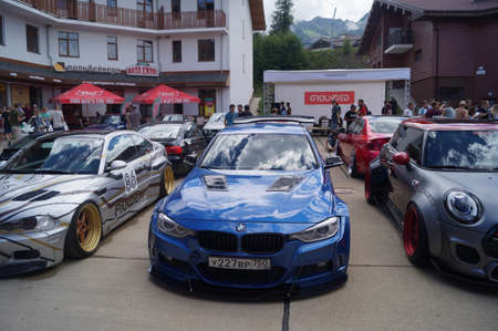 Sochi, Russian Federation, August 2018: Open automobile festival Grounded event. Unusual BMW car tuning, air suspension, sports parts and polished wheels. Stance. In the hotel parking lot.のeditorial素材