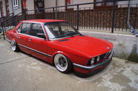 Sochi, Russian Federation, August 2018: Open automobile festival Grounded event. Unusual BMW car tuning, air suspension, sports parts and polished wheels. Stance. In the hotel parking lot.のeditorial素材