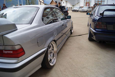 Sochi, Russian Federation, August 2018: Open automobile festival Grounded event. Unusual BMW car tuning, air suspension, sports parts and polished wheels. Stance. In the hotel parking lot.のeditorial素材