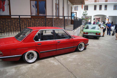 Sochi, Russian Federation, August 2018: Open automobile festival Grounded event. Unusual BMW car tuning, air suspension, sports parts and polished wheels. Stance. In the hotel parking lot.のeditorial素材