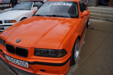 Sochi, Russian Federation, August 2018: Open automobile festival Grounded event. Unusual BMW car tuning, air suspension, sports parts and polished wheels. Stance. In the hotel parking lot.のeditorial素材