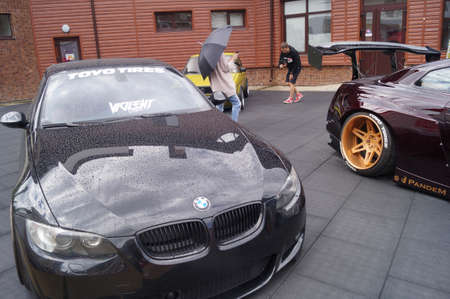 Sochi, Russian Federation, August 2018: Open automobile festival Grounded event. Unusual BMW car tuning, air suspension, sports parts and polished wheels. Stance. In the hotel parking lot.のeditorial素材
