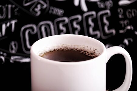 coffee on the blackboard with coffee beans