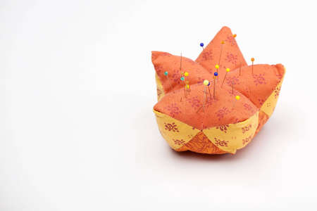 Pincushion with various needles and pinsの写真素材