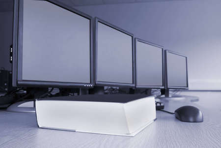 Computers and training book in laboratory