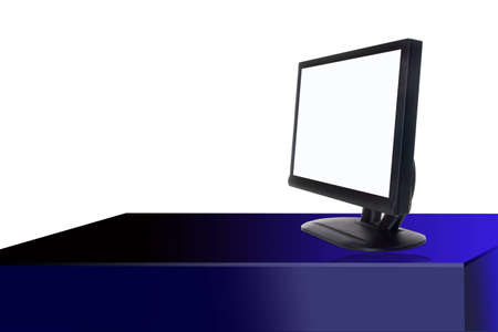 Digital widescreen monitor on futuristic desk against white