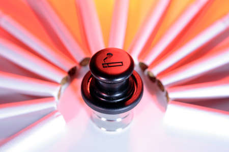 Cigarettes and car lighterの写真素材