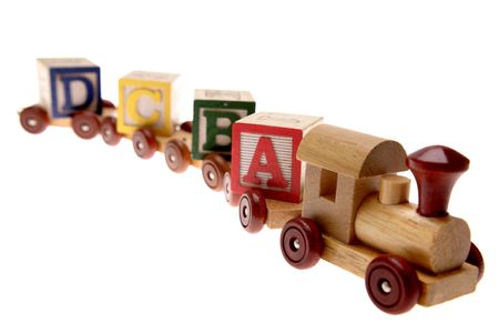 Toy train and learning blocks isolated over whiteの写真素材