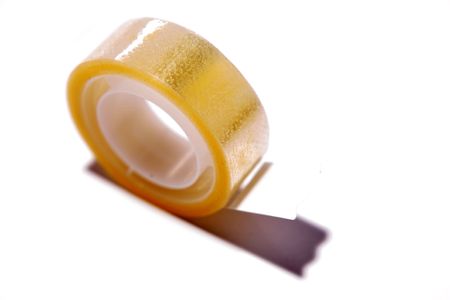 Roll of adhesive tape on whiteの写真素材