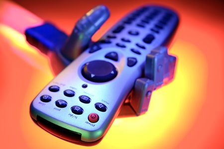 Robot hand holding remote control