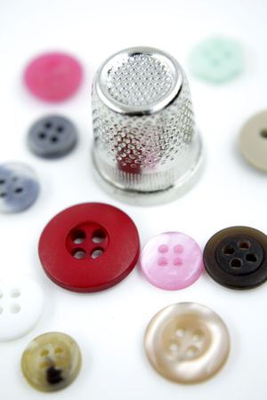 Buttons and thimbleの写真素材
