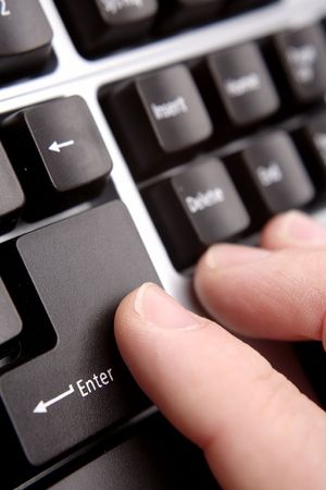 Closeup of fingers on  keyboard
