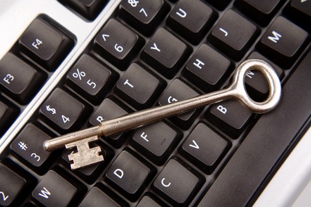 Old key on computer keyboard