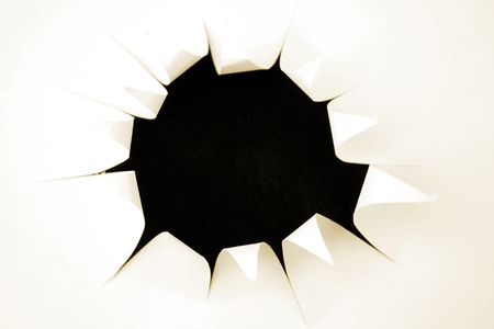 Hole in paperの写真素材