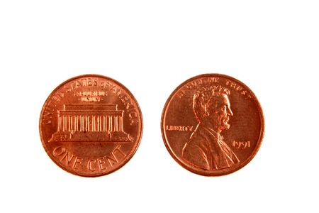 American one-cent coins isolated on whiteの写真素材