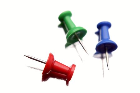Three push pins on white backgroundの写真素材