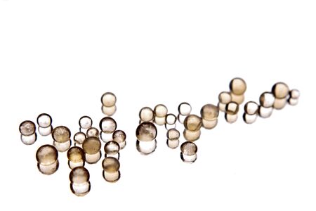 Clear beads over white backgroundの写真素材