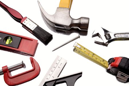 Assortment of tools on white background