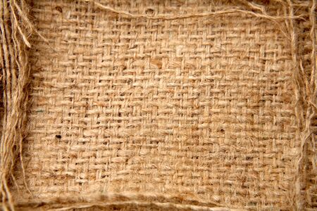 Hole cut in burlap sacking