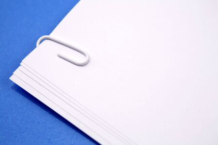 Paper clip on corner of papers