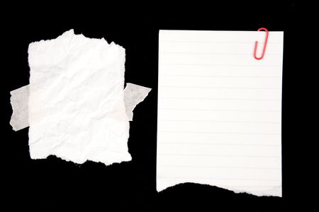 Two pieces of paper on blackの写真素材