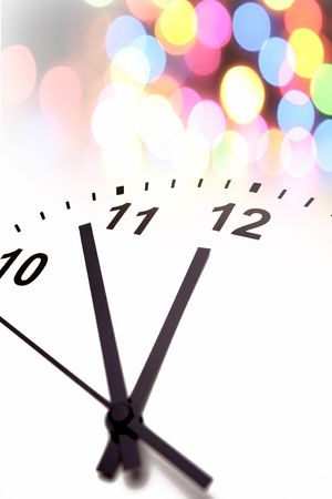 Clock and colorful lights. Symbolic. Christmas. New Year.