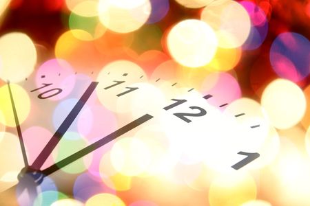 Clock and colorful lights. Symbolic. Christmas. New Year.の写真素材