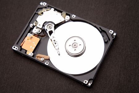 Computer hard-drive on dark background   
