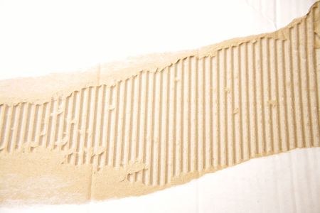 Rip in corrugated cardboard   の写真素材