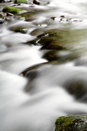 Beautiful stream flowing in motion. Natural backgroundの写真素材